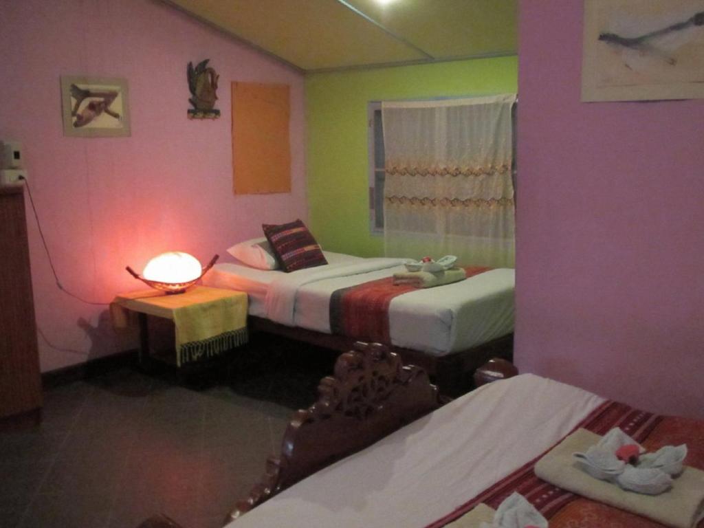 Orchid Hibiscus Guest House Sukhothai Quarto foto